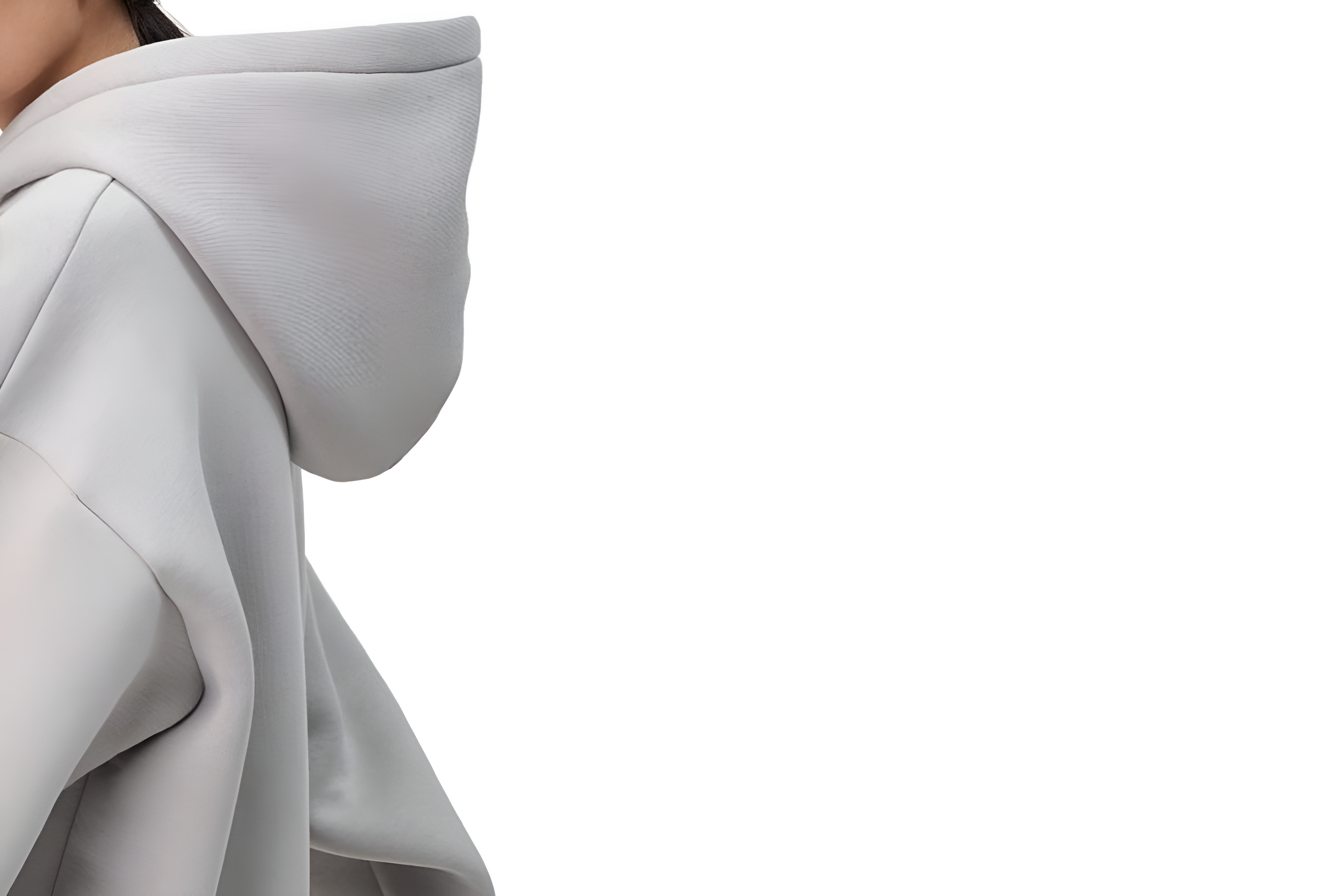 Close-up of a gray hooded garment on a white background